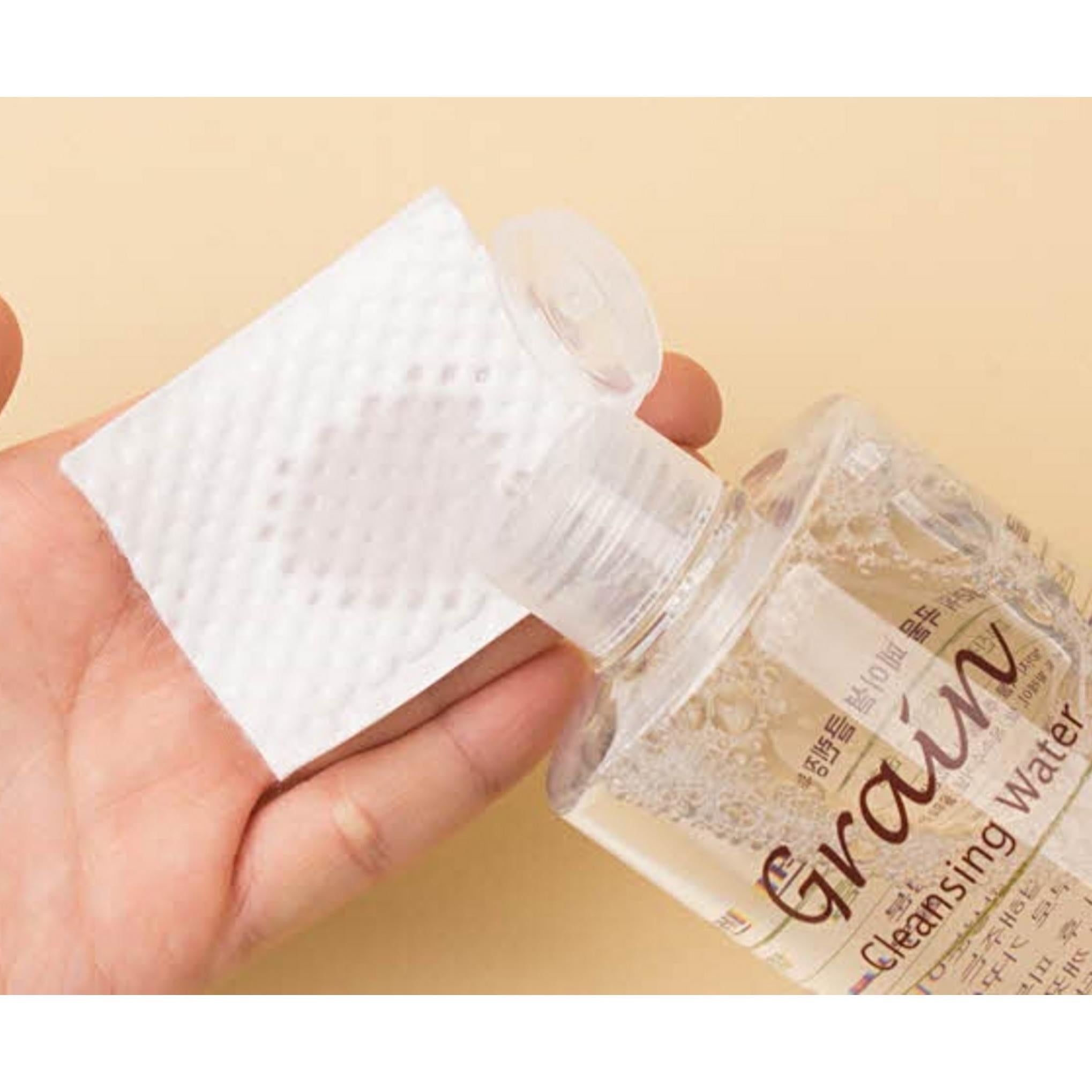 Agua limpiadora facial con granos de flores Medi